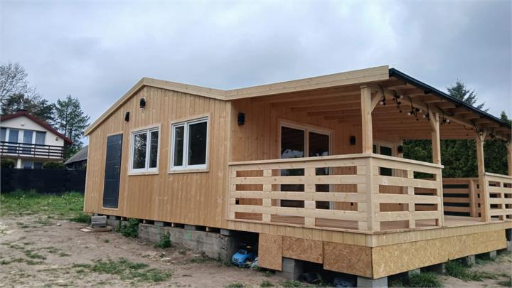 Domek posadowiony na bloczkach - realizacja Pan Domek