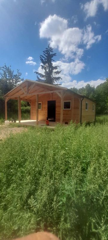 Domek letniskowy z szerokim gankiem - realizacja Pan Domek