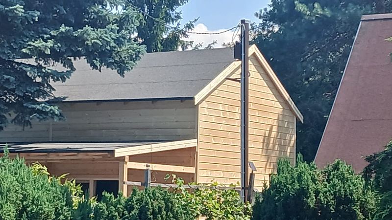 Tylna elewacja domku drewnianego z poddaszem - realizacja Pan Domek