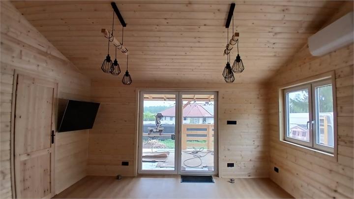 Salon z wyjściem na taras - realizacja Pan Domek